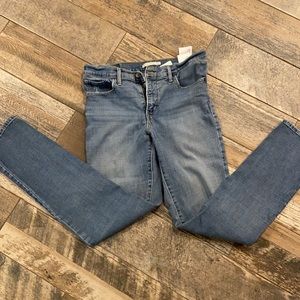 Very loved/worn in Levi’s 312 shaping slim jeans